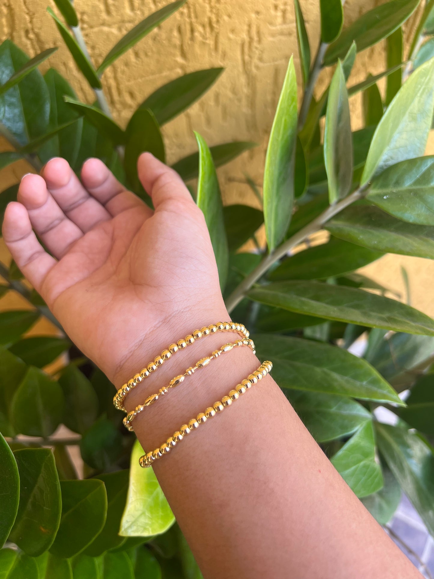 Pulseras doradas