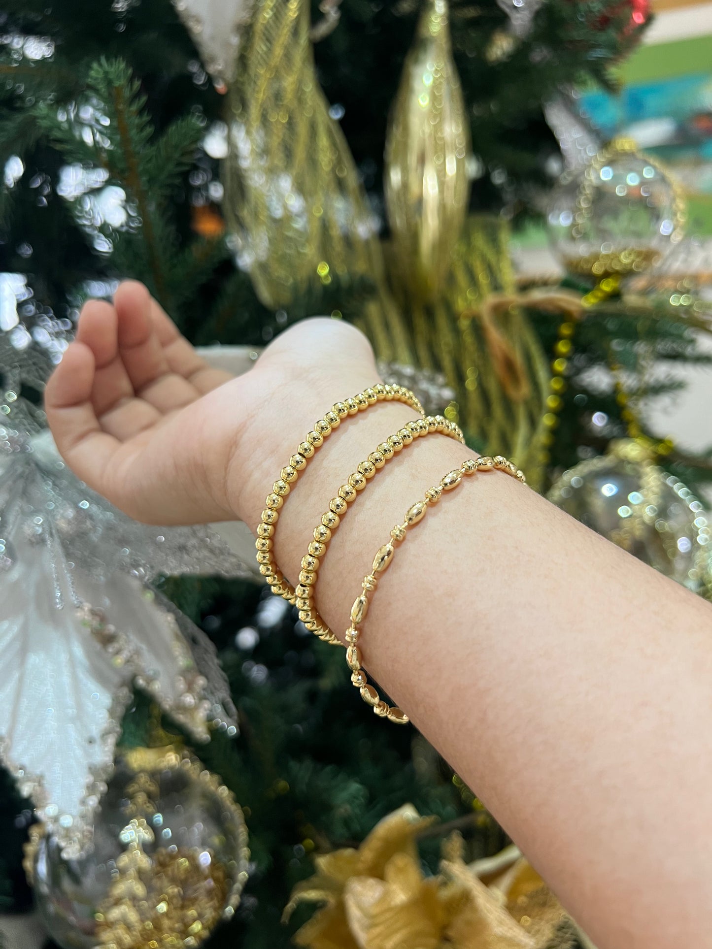 Pulseras doradas